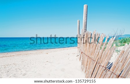 reed palisade in a Sardinia beach