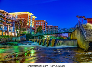 Reedy River and RiverPlace Bridge in Downtown Greenville, South Carolina, USA.