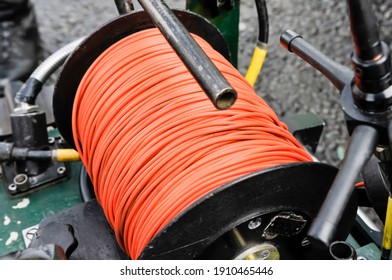 Reel of detonator cord on the back of an army robot, used to detonate controlled explosions