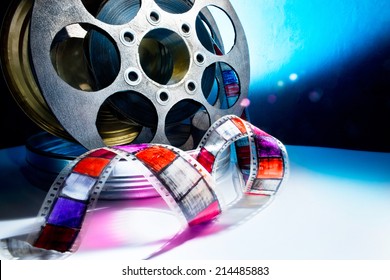 Reel of film on a color background