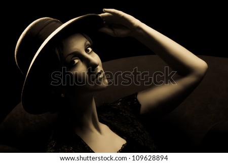 Reenactment of the Chanel style of dressing and lighting