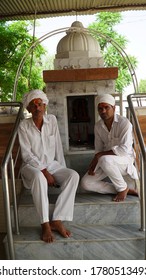 Reengus, Sikar, Rajasthan, India - July 2020: Portrait Shoot Of Rajasthani Men With White Pagadi (turban), Kurta And Pyjama Sitting In Temple