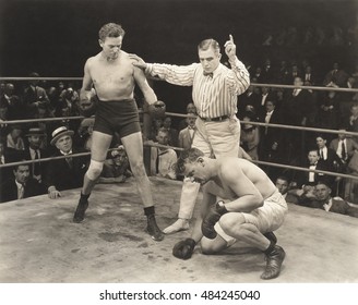Referee counting over boxer in ring