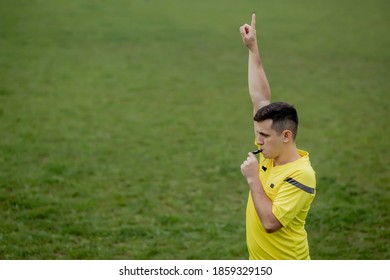 Referee indicates a violation of the rules. Concept of sport, rules violation, offside