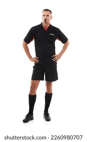 Referee man, portrait and blowing whistle, angry with soccer foul and warning in game isolated on white background. Sports, fitness and compliance, rules and male in studio with football penalty