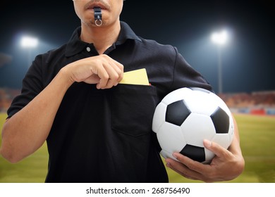 Referee Showing A Yellow Card