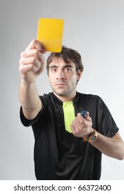 Referee Showing A Yellow Card