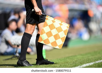 Referee Shows Flag On The Field