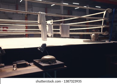 referee table put on the side of boxing ring with a ring bell - Powered by Shutterstock