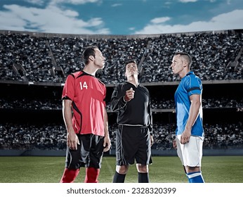Referee tossing coin in soccer game