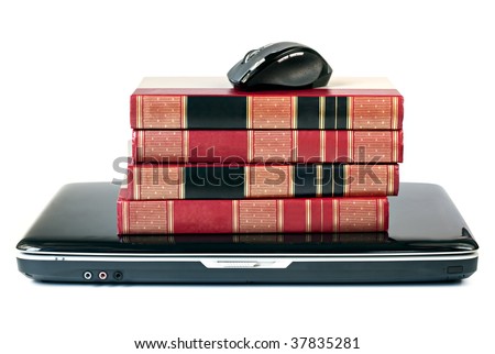 Reference books stacked on top of a laptop, with mouse.  On-line learning concept.  Isolated on white.