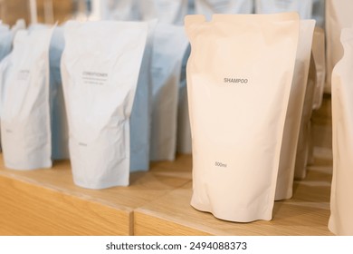 Refill packet. Zero waste. Reuse reduce recycle concept. refill liquid soap, shampoo and other products. Plastic packaging for refill pouch in store.