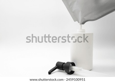Refill to reduce plastic waste. soap or shampoo for refill. plastic bottles for refill liquid soap, shampoo and other products. Zero waste. Reuse reduce recycle concept.