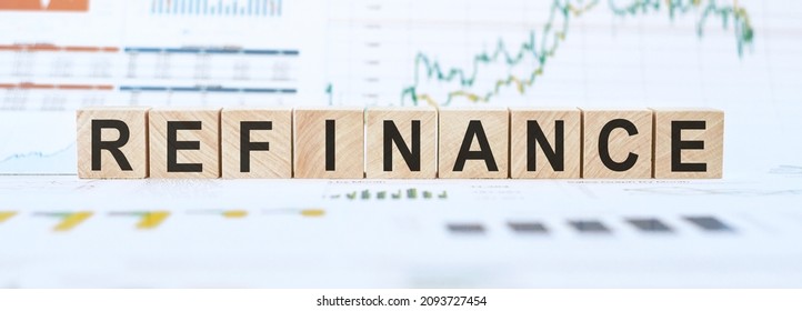 Refinance text written in cubes on a white background - Shutterstock ID 2093727454