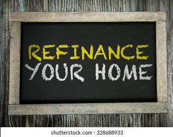 Refinance Your Home Written On Chalkboard