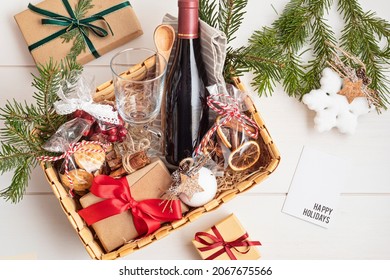 Refined Christmas Gift Basket For Culinary Enthusiats With Bottle Of Wine And Mulled Wine Ingredients. Corporate Hamper Or Personal Present For Cooking Lovers, Foodies And Gourmands.