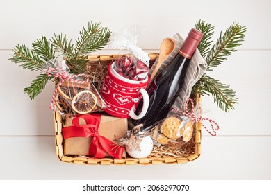 Refined Christmas Gift Basket For Culinary Enthusiats With Bottle Of Wine And Mulled Wine Ingredients. Corporate Hamper Or Personal Present For Cooking Lovers, Foodies And Gourmands.