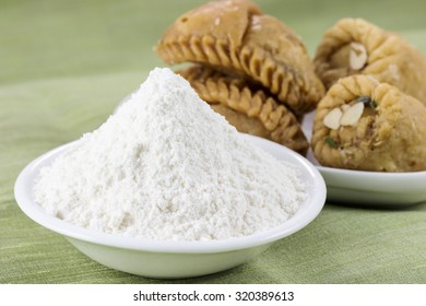 Refined Wheat Flour In A White Bowl; Indian Sweets BaluShahi Made With Refined Wheat Flour.