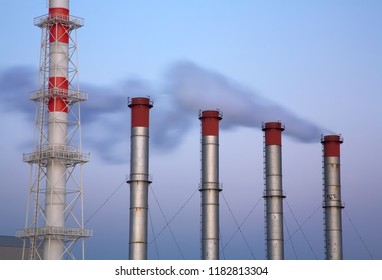 Refinery Smoke Stacks Against Grey Sky Stock Photo 1182813304 ...