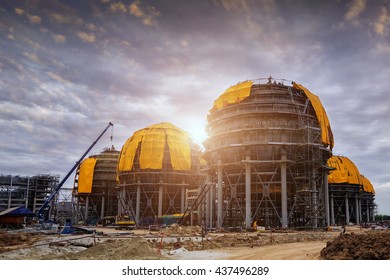 Refinery Storage Tanks . A Large Oil-refinery Plant With Liquefied Natural Gas (LNG) Storage Tanks In Construction.