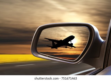 Reflected Road In Rearview Mirror