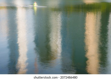 Reflection Of Austin, TX Skyline In The River. Abstract View Of Kayaker