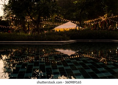 Reflection Background Of Camping Party With Pool At Evening Time With Natural Light