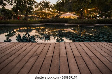 reflection background of camping party with pool at evening time with natural light