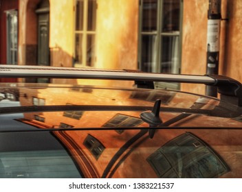 reflection in a black car