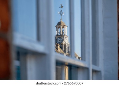 The reflection of Brackley town hall clock tower