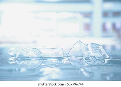 Reflection Broken Beaker Glass In Science Laboratory With Blue Light   