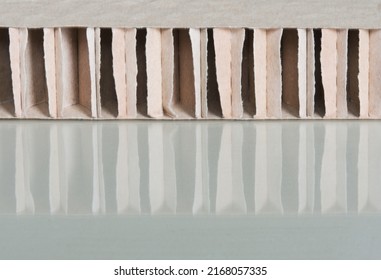 Reflection of brown cardboard spacer with stiffener 