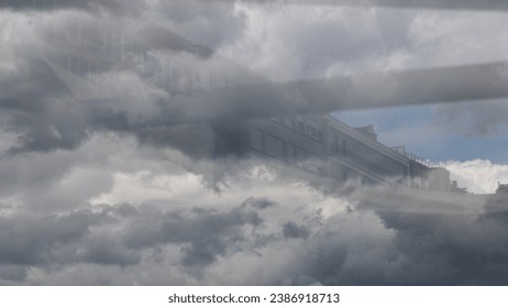Reflection of the building and clouds  