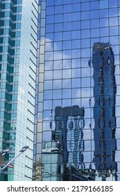 Reflection of a building on another building