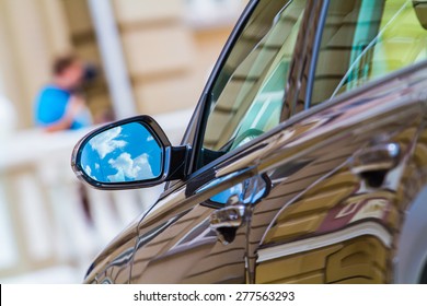 Reflection at the car side mirror