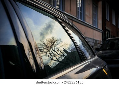 Reflection in a car window 
