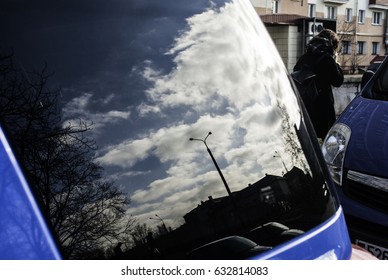 Reflection of the City in a Car Window