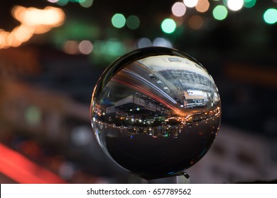 A Reflection Of A City In A Crystal Ball