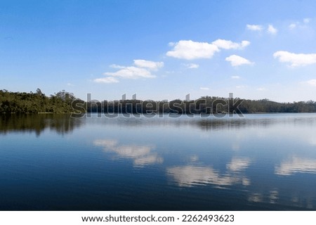 Reflection of clouds in lake water