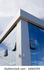 reflection of clouds an office building
