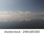 reflection of clouds on the lake