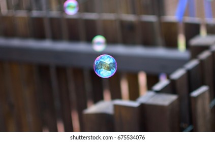 Reflection in Colorful Bubbles