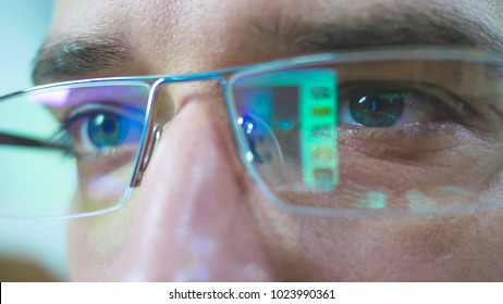 Reflection Of The Computer In Glasses. Eyes And Glasses