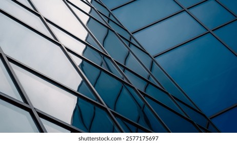 reflection with distortion in the window of a modern building color blue abstract urban background