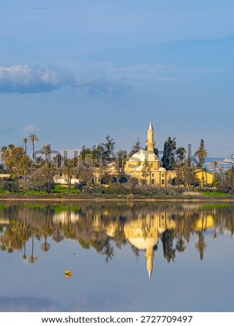 Reflection of Hala Sultan Tekke mosque in lake near city Larnaca, Cyprus