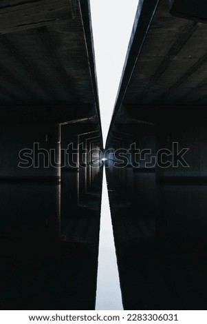 Reflection of highway bridges on water