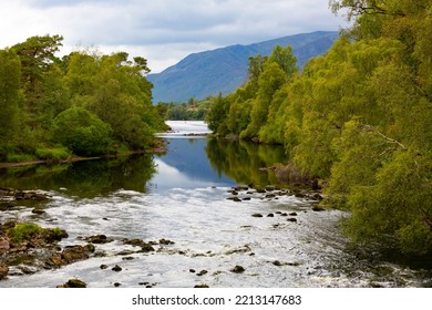 Reflection Of A Hill In A Loch In Glen Affric Scotland