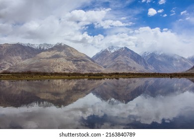 The Reflection Of Himalayan Mountain Range In Kashmir