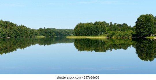 Reflection in Lake, North Finland, Lapland - Shutterstock ID 257636605