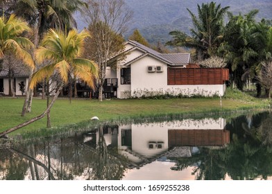 reflection of a lakeside house